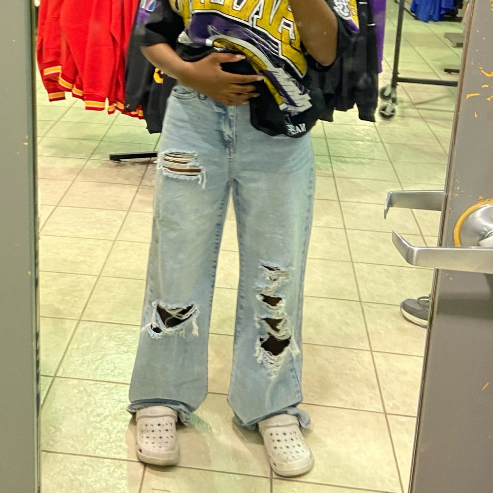 Light blue denim ripped jeans